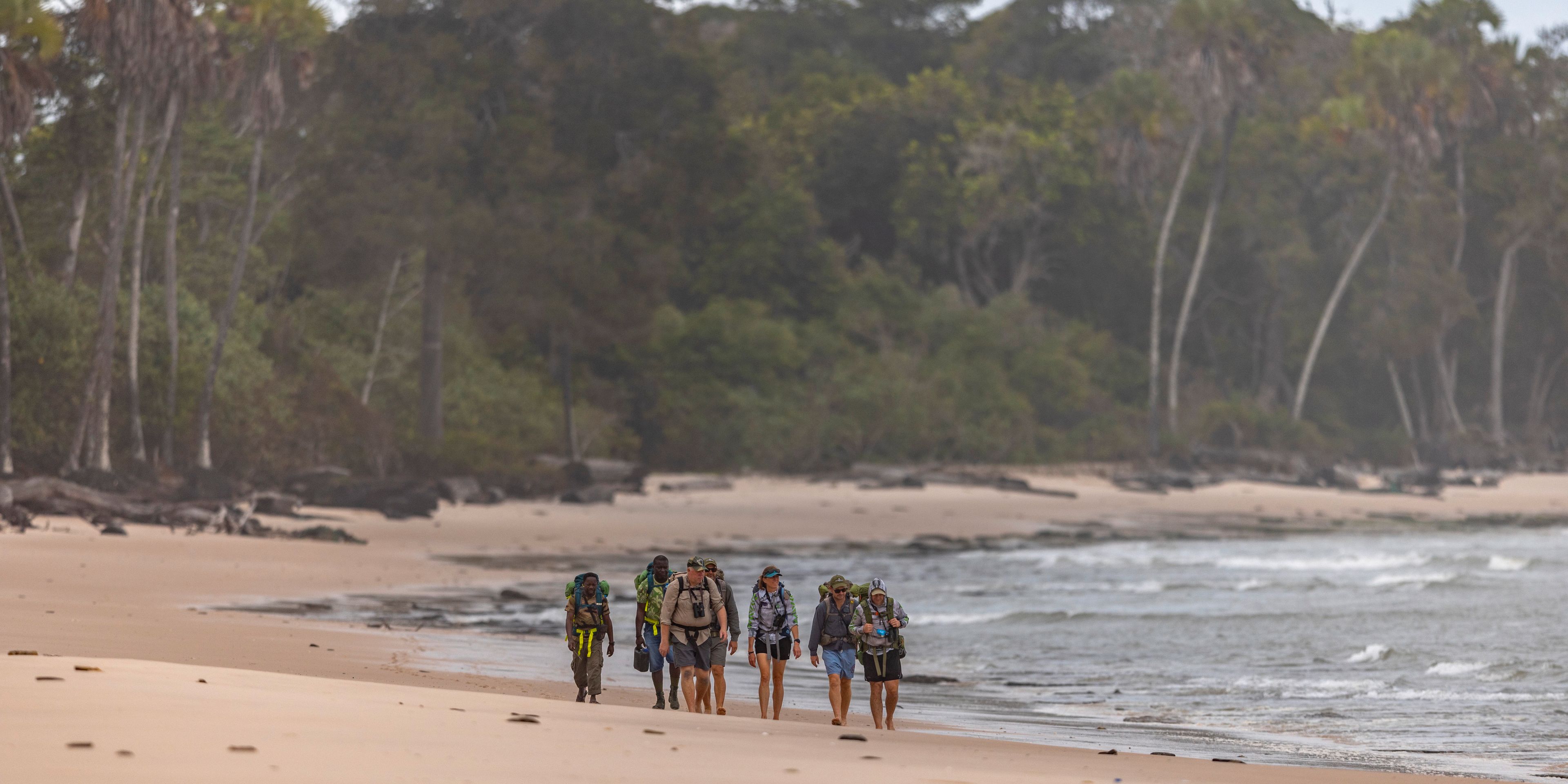 natucate-nature-travel-gabon-wilderness-trails-beach-group-walking