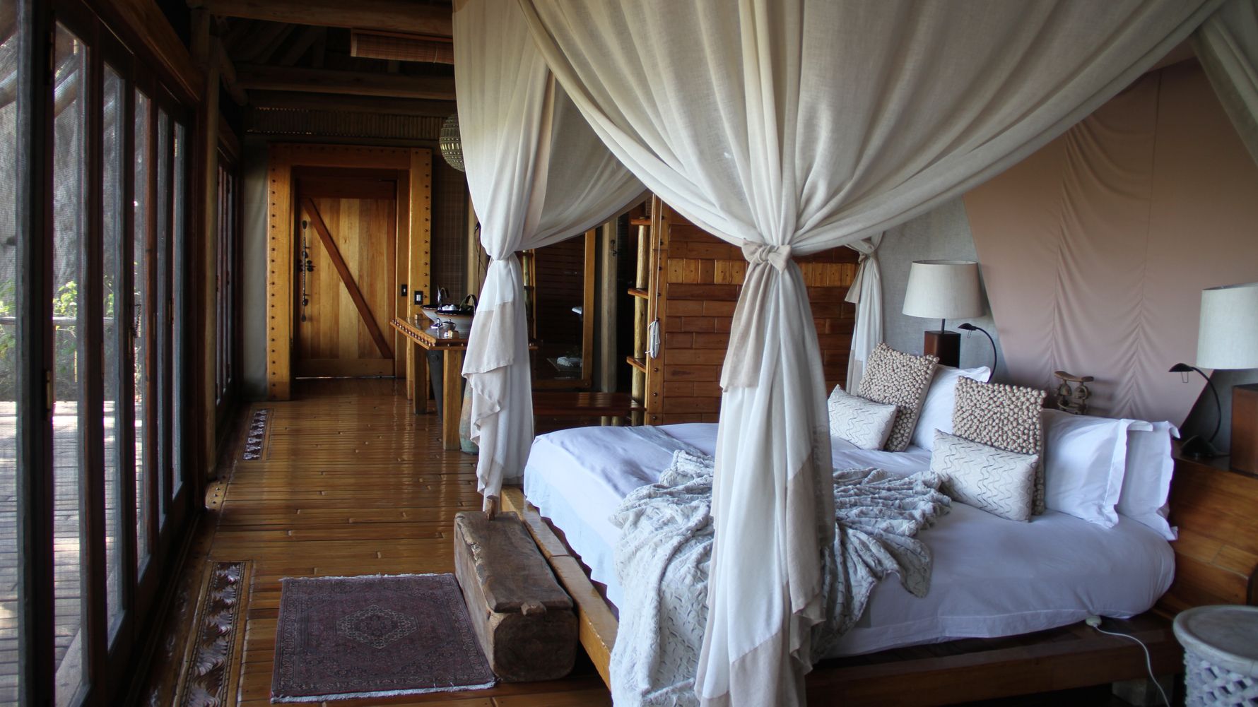 Safari lodges Africa: looking in to the bedroom of a lodge in Botswana