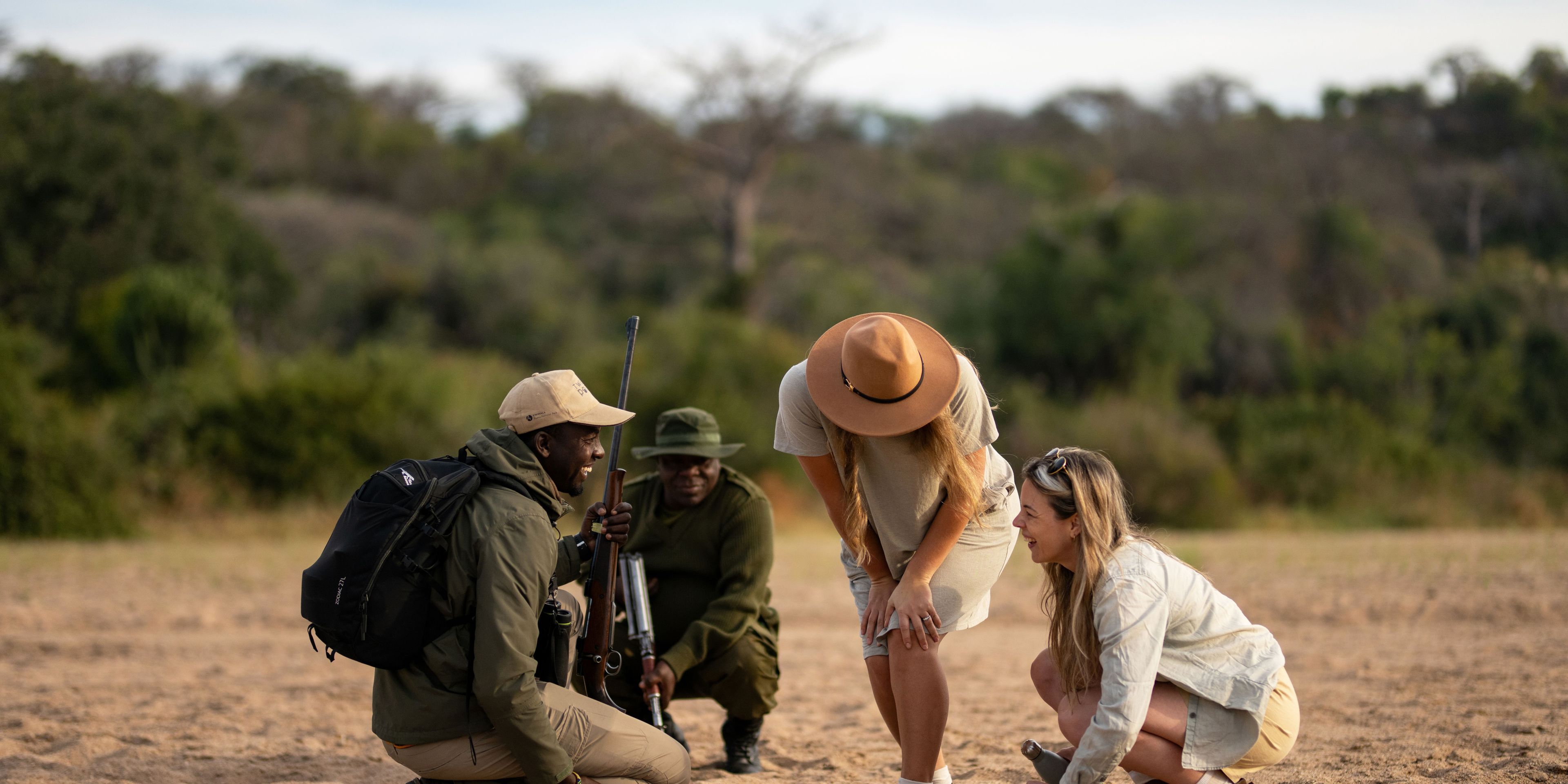 Four people on wildlife tracking