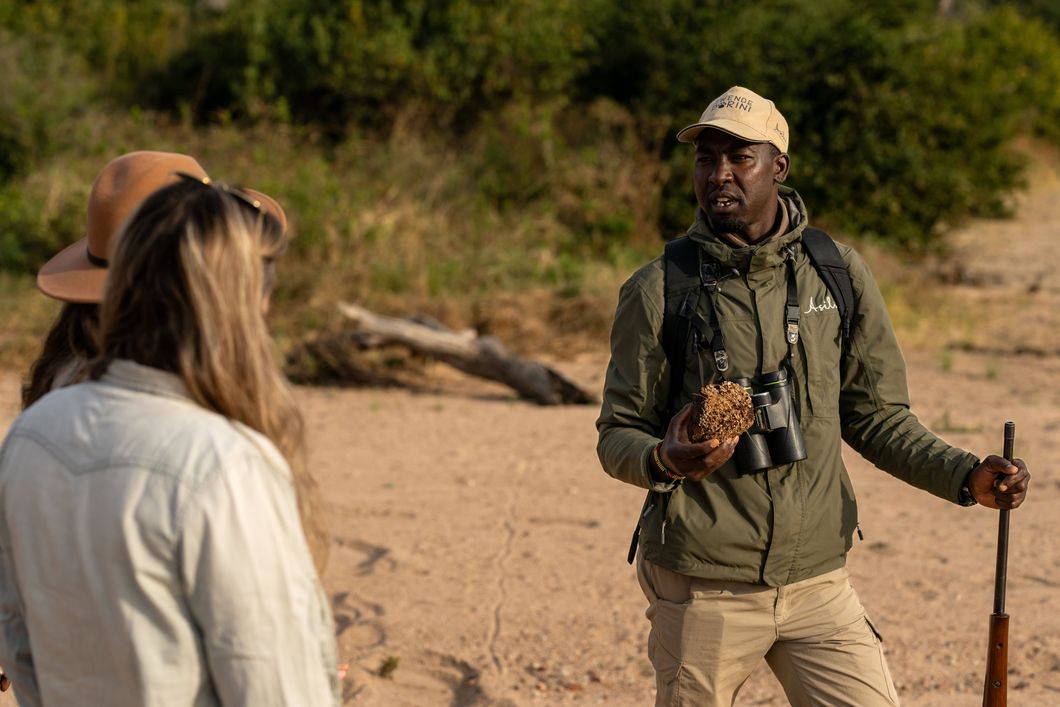 natucate-pwe-tanzania-kokoko-guide-explaining