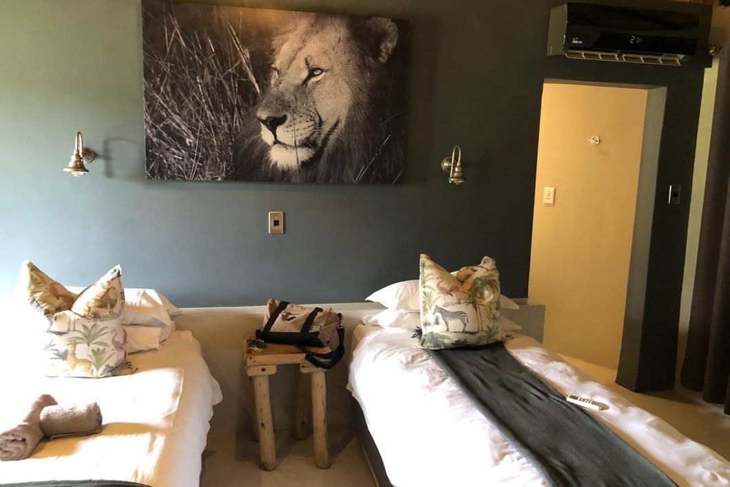 Looking into a bedroom of a lodge in South Africa which serves as accommodation for the game ranger short course
