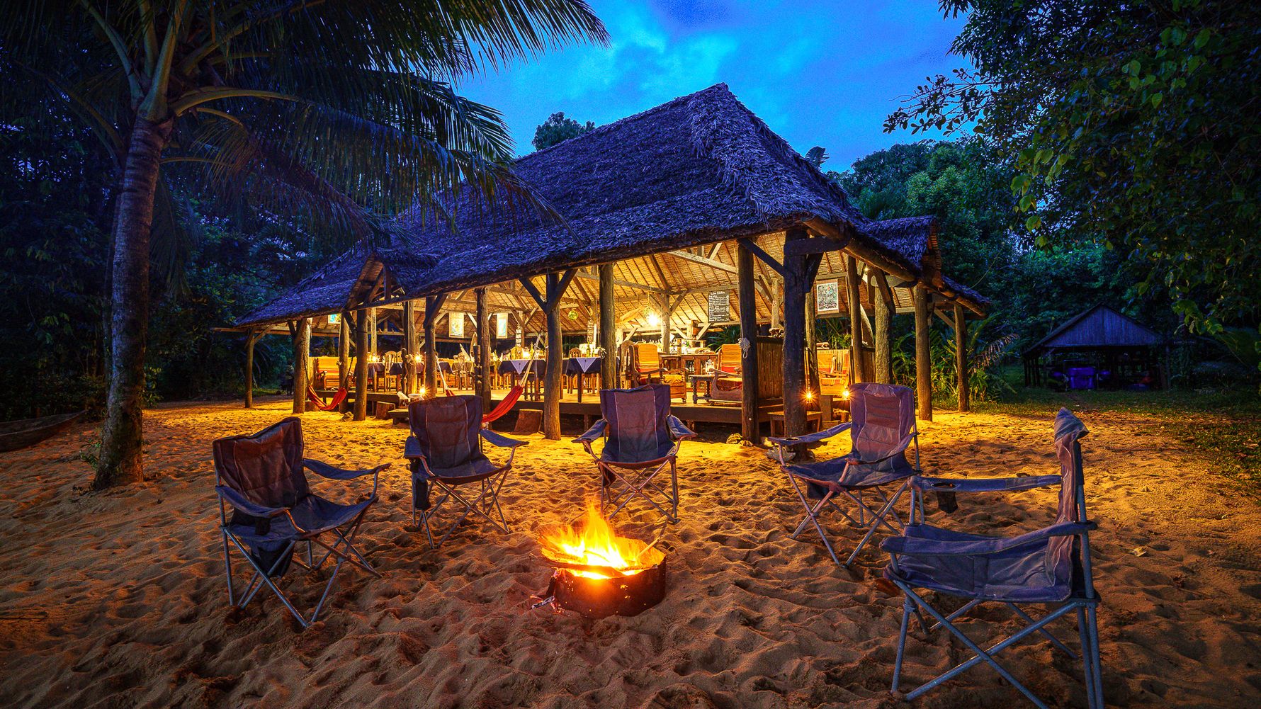 Campfire with chairs in the evening in Masoala