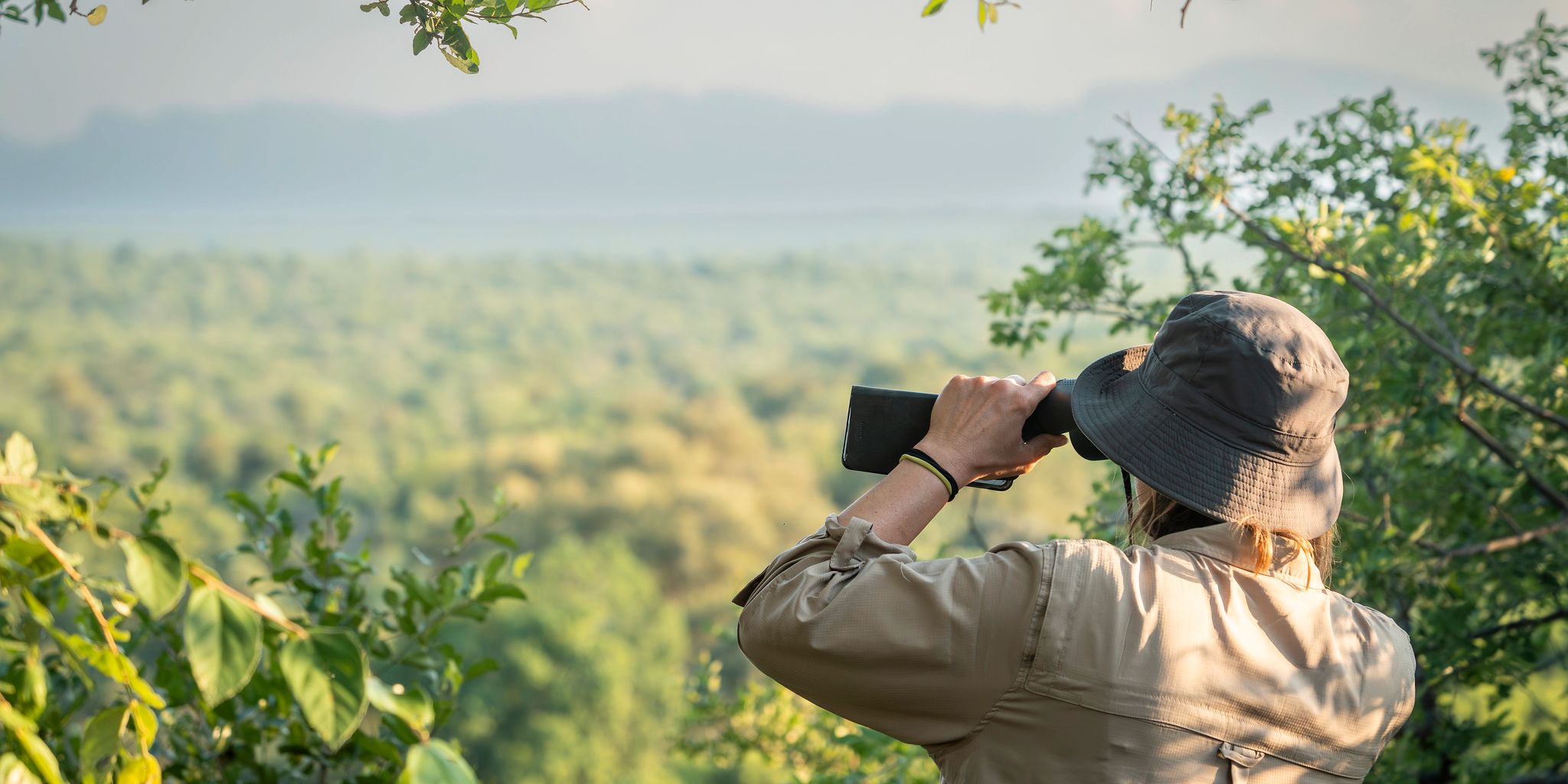 natucate-guide-courses-bw-south-africa-view-binos-woman