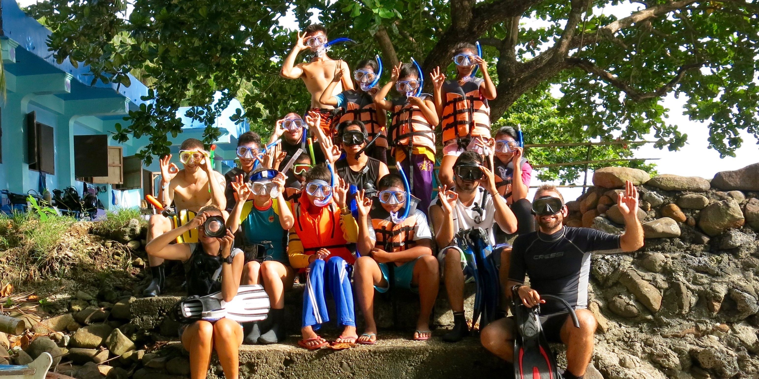 A group of volunteers in the Philippines getting ready for a dive