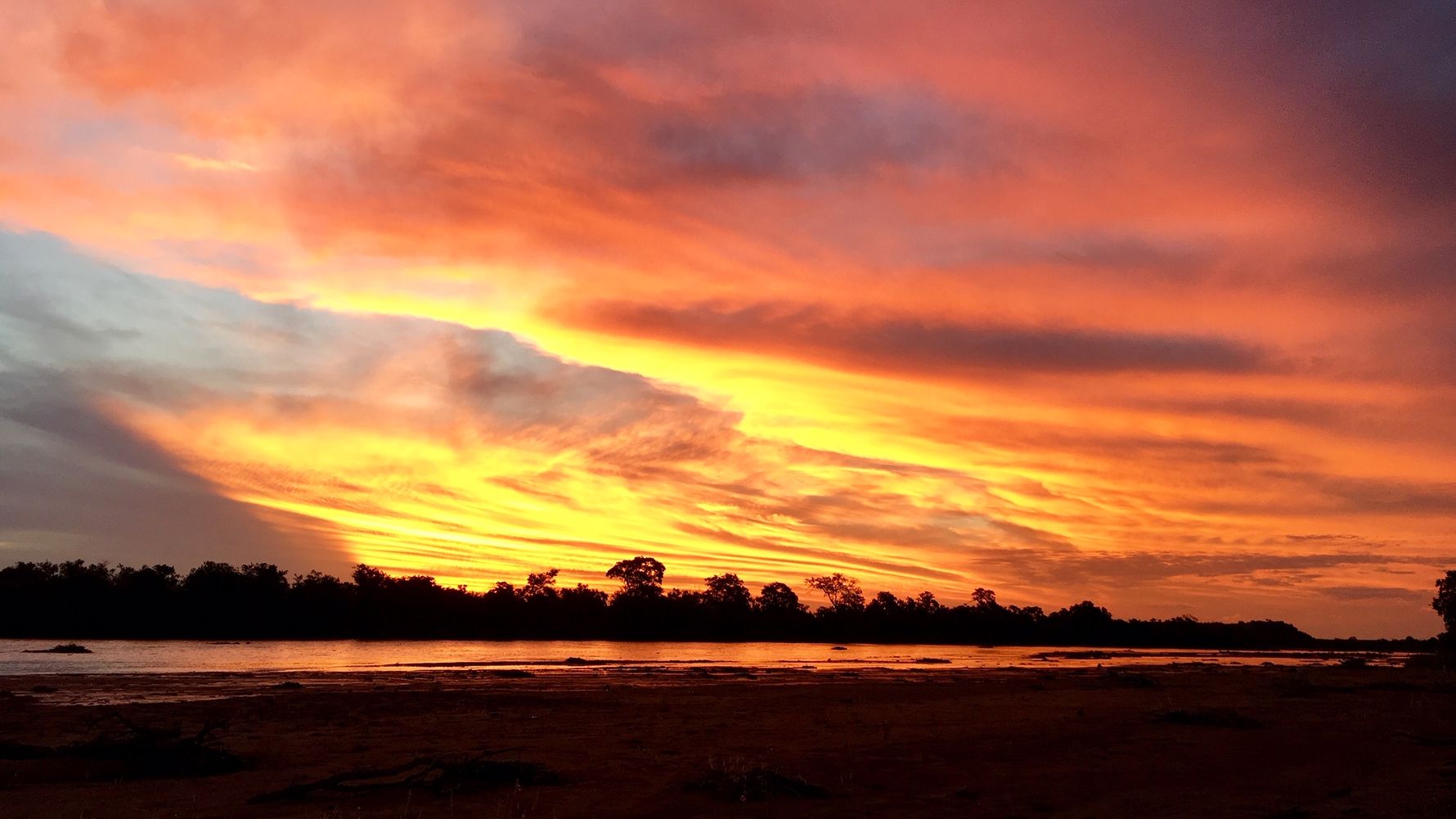 erfahrungsberichte-rangerkurse-suedafrika-field-guide-level-1-juliana-sonnenuntergang-wolken-natucate
