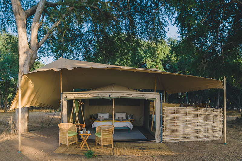 safari-zambia-authentic-kutali-camp-tent-outside-wooden