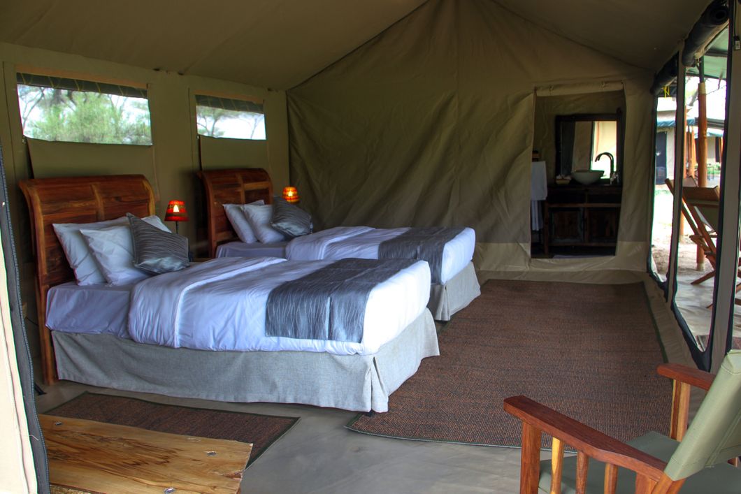 natur-und-rangerkurs-tansania-afrika-safariguide-tent-doublebed-natucate