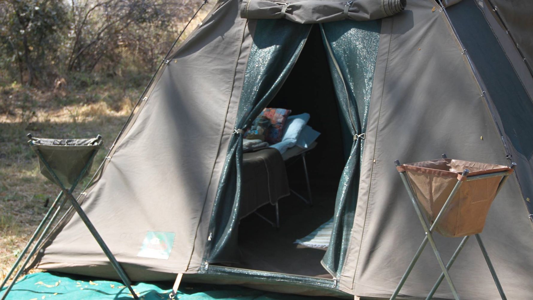 Mobile safari in Africa: looking into the safari tent of a mobile camp in Botswana