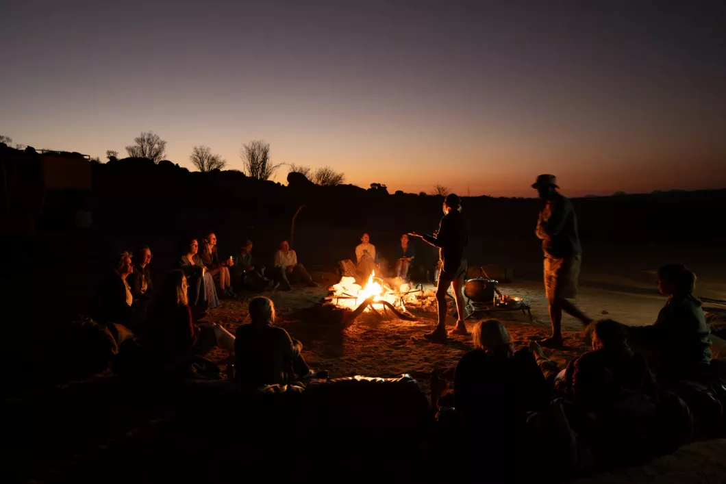 Campfire under the night sky