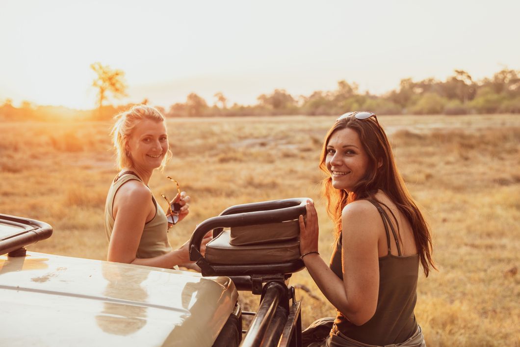 Two women enjoying the sunset in Botswana